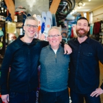 Three staff members smiling at Gerick Cycle in Nelson BC