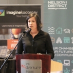 President speaking at the podium at the AGM