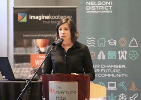 President speaking at the podium at the AGM