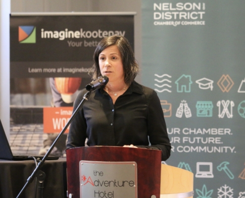 President speaking at the podium at the AGM