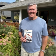 Cal Renwick with the Pacific Cup program.